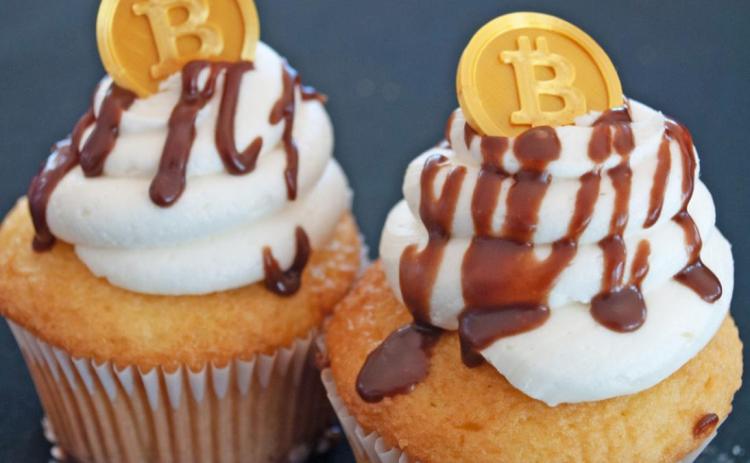 BOYD’S BITCOIN BYTES were served up by a Spur baker at Argo Blockchain’s grand opening May 5. | THE TEXAS SPUR