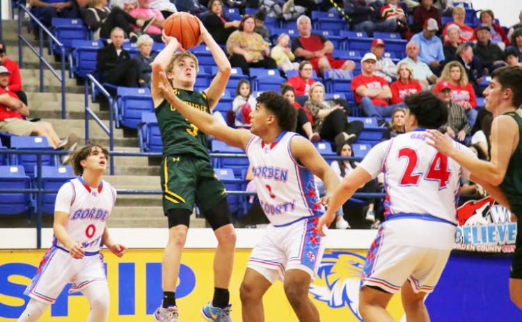 JAGS FALL The Guthrie Jaguars boys varsity basketball team fell to the Borden County Coyotes 49-33 in last week’s bi-district playoff game. | COURTESY PHOTO