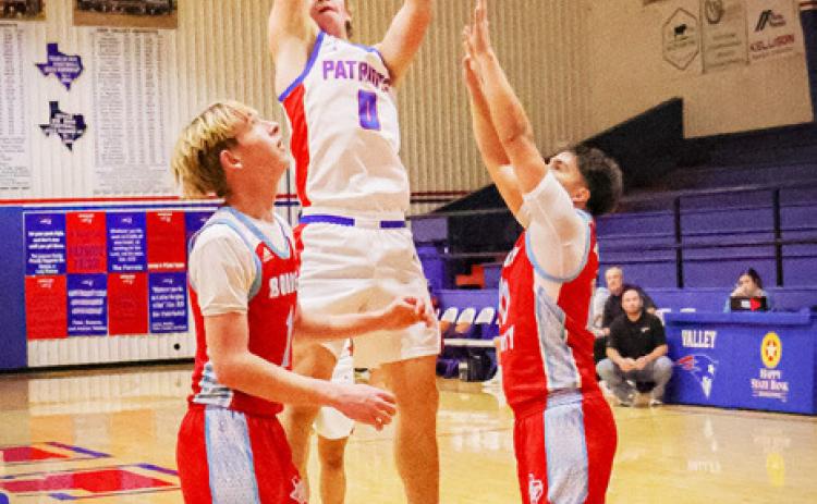 TWO IN THE PAINT Senior Carson Tucker drives the lane against the Borden County Coyotes at home Dec. 4. | DEY LANE