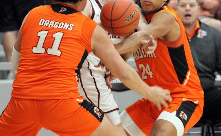 SEASON ENDS The Paducah Dragons boys varsity basketball team’s season came to a close Friday night as they fell to the Klondike Cougars 70-35 in Abernathy. | COURTESY PHOTOS