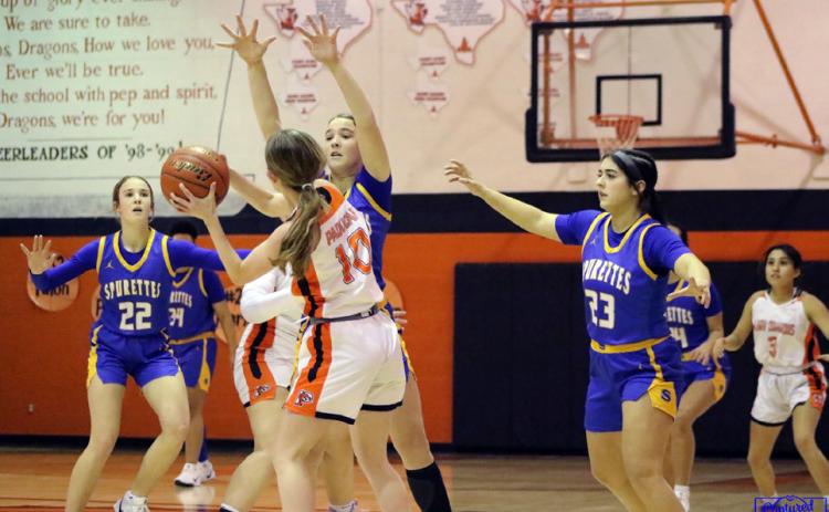 PADUCAH BASKETBALL Last week Paducah split a pair of games with Spur.The Dragons defeated the Bulldogs 58-33, and the Lady Dragons fell to the Spurettes 88-6. | COURTESY PHOTOS