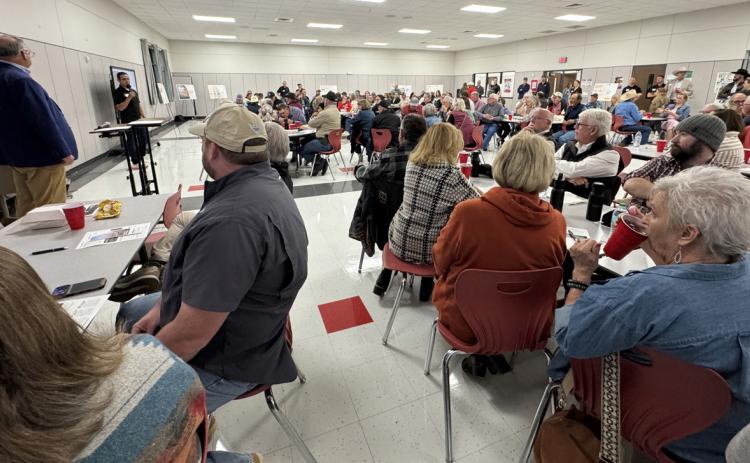 SOME 200 CITIZENS of Briscoe County, and others, came out on a rainy evening to hear Soluna representatives make their case for a data center, and to chat with their elected officials; a bye week in the high school football schedule made for an ideal opportunity to turnoutacrowd.AsandwichmealwascateredbySilverton’sMaltShop. MORESPOTLIGHT PHOTOS, PAGE 8 | CAPROCK COURIER