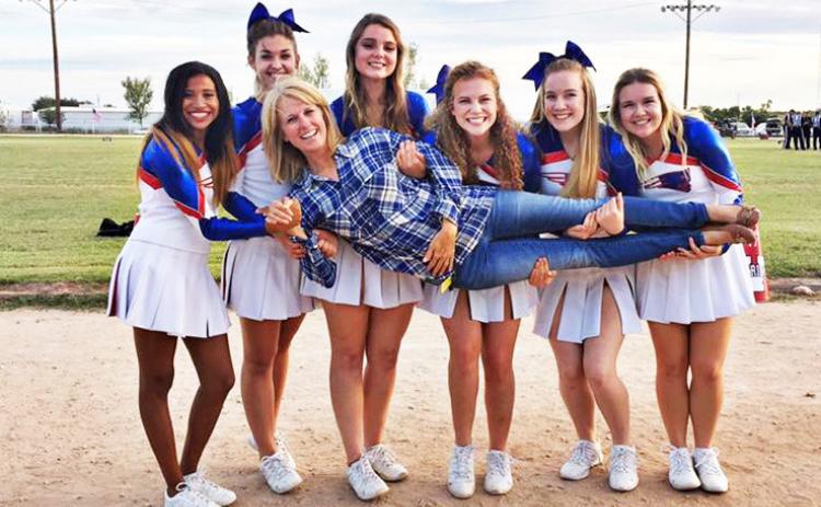 CHEERS!The legacy ofValley ISD’s longtime superintendent Jackie Jenkins is wrapped up in one pose—with the Patriots cheerleaders giving her a lift on the road to retirement. | COURTESY PHOTO