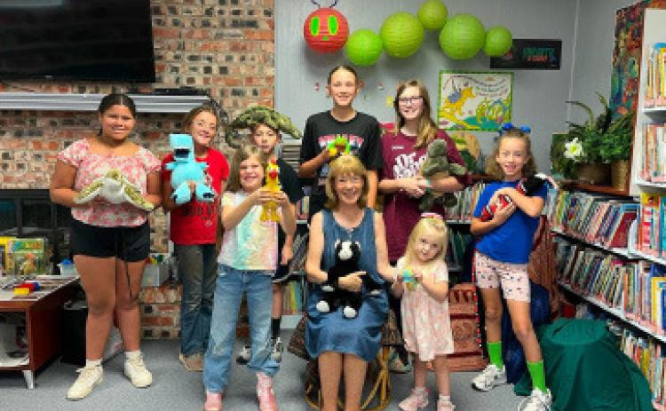 10,979 PAGES READ Caprock Public Library’s young patrons racked up some impressive reading totals over the summer, and celebrated with a party July 29. | COURTESY PHOTO