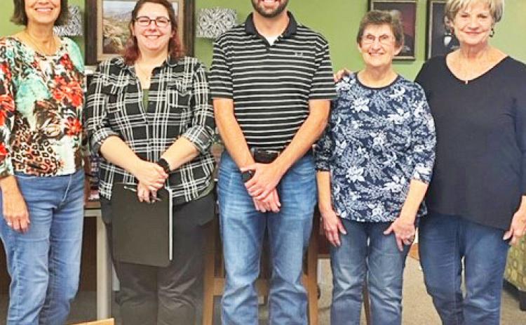 BRISCOE NEWS HISTORY In mid-November two representatives from Southwest Collection/ Special Collections Library of Texas Tech University, Morgan White and Austin Allison, came to the Silverton Public Library to pick up the library’s back issues of Briscoe County News. They will digitize the newspapers to add to what is already online. From left are Laura Long, MorganWhite, Austin Allison, Kathy Kingery and Tina Nance. | COURTESY PHOTO