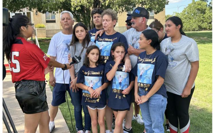 FAMILIES REMEMBER The Reece family, a dozen strong, traveled from Abilene, Texas, to Matador to mourn the death of Victor Valenzuela, Junior. | KCBD PHOTO