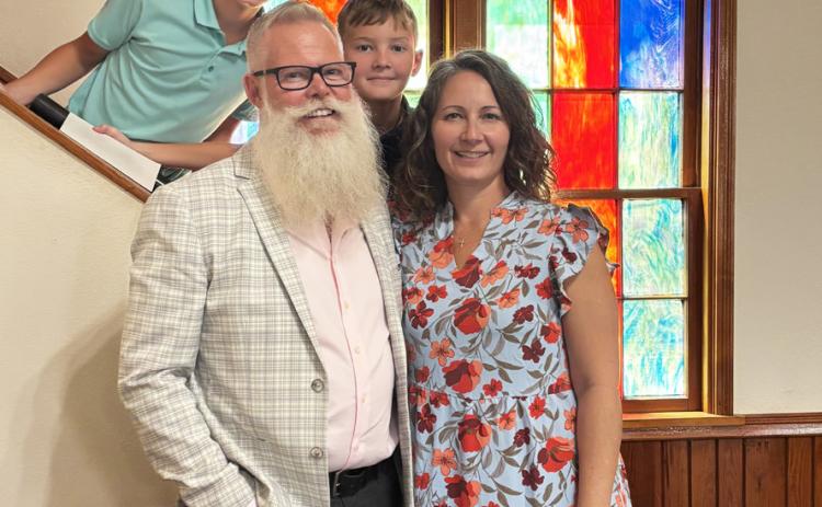 NEW PASTOR at First Baptist Church of Matador Leon Radford (front left, standing) has lived Matador for the past three years. The Caprock Courier looks forward to featuring Radford in a lengthier story soon, along with his wife, Matador native Tanya (right) and sons Eli and Liam (back row, from left). | COURTESY PHOTO