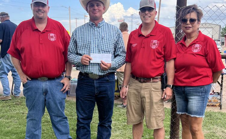 FARM BUREAU HELPS The Texas Farm Bureau donated $5,000 to the Silverton Volunteer Fire Department at the annual Silverton 4th of July picnic. From left are Kody Rhoderick, VFD assistant chief; Farm Bureau rep, Chance Rhoderick, JoDee Robison, chief; and NormaTrevino, fire department secretary. | COURTESY PHOTO