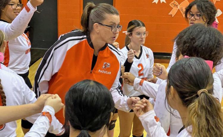 POSTGAME Paducah volleyball coach Alicia Nash post-game talk after the match with Benjamin. Nash’s team played a gritty three-set district contest with the league leading Lady Stangs. | SUE JANE SULLIVAN