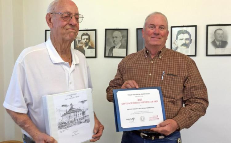 MOTLEY HONOR Ronald Bailey is recognized by Judge Jim Meador for contributing with research on historic Matador businesses, helping the Motley County Historical Commission earn the 2021 Distinguished Service Award from the Texas Historical Commission. | COURTESY PHOTO