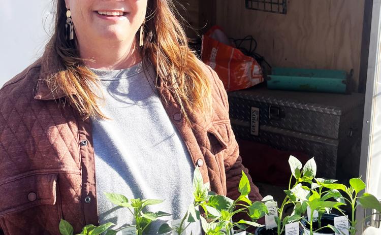 GREEN THUMBS Chelle’s Garden co-owner Rachelle Watson looks forward to helping local gardeners and homeowners bring some green into their landscapes. Husband Brady is collaborator in the enterprise. | COURTESY PHOTO