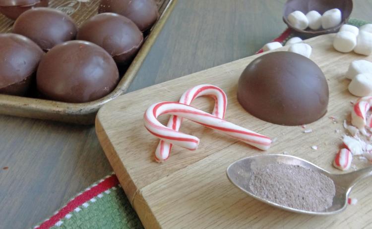 JUST DROP INTO WARM MILK and the cocoa bomb’s magic will happen quickly, depending on how hot the cup of milk is. | ANGELINA LARUE