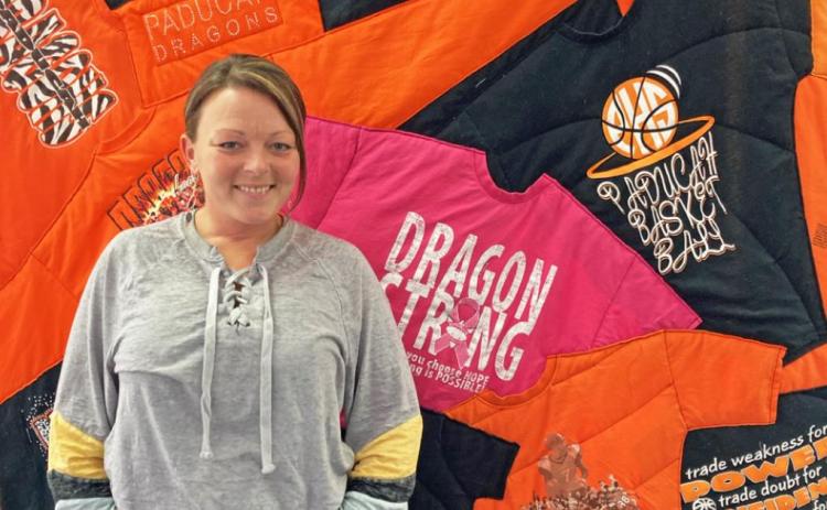 Patchwork owner Jessie Wittekiend creates a variety of colorful specialty quilts, like this one made from Dragons T-shirts. | COURTESY PHOTO