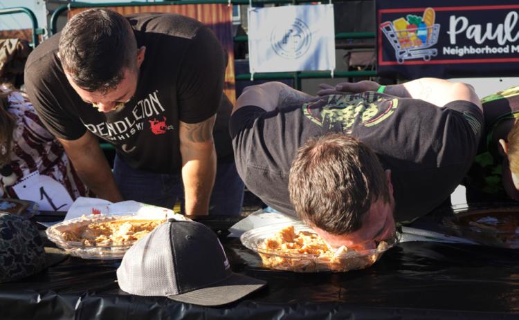 PIE NOT? It’s all in good fun, with hands behind backs for a race from filling to the bottom of the crust at last Saturday’s Foothills Celebration in Matador. SPOTLIGHT PHOTOS, PAGE 8
