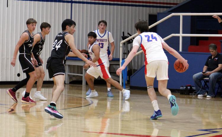 FRESHMAN CORBIN TAYLOR looks for a hole against the Texline defense Tuesday night. | COURTESY PHOTO