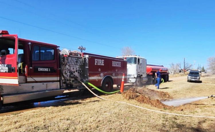 TURKEY VFD ASSISTED CITY employees with infrastructure improvements, used the fire engine to wash out a silted culvert last Thursday. | COURTESY PHOTO