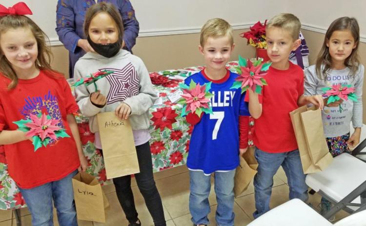 Caprock library takes youngsters on tour of ‘Christmas Around the World’