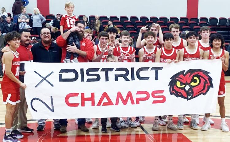 BACK-TO-BACK CHAMPS The Silverton Owls varsity boys basketball team have claimed back-to-back District 2-1A championships. They finished district play last week at Groom, defeating the Tigers 41-24, to win sole possession of the district title. Their final district record was 9-1 and their only loss came to Valley. At press time, the opponent/location of their bi-district playoff game was not known. | COURTESY PHOTO