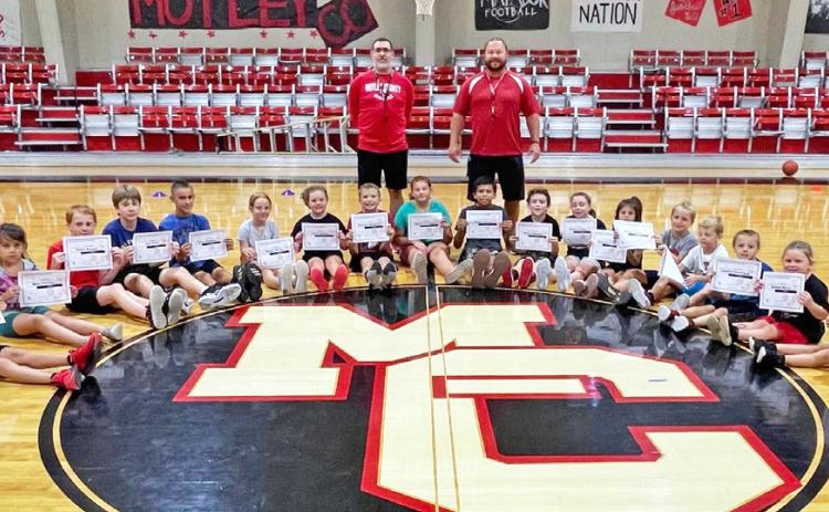 MATADOR CAMP Future Motley County athletes, shown with Coaches Benjamin Ridgely and Mike Bigham, enjoyed three days of camp in late July. | COURTESY PHOTO