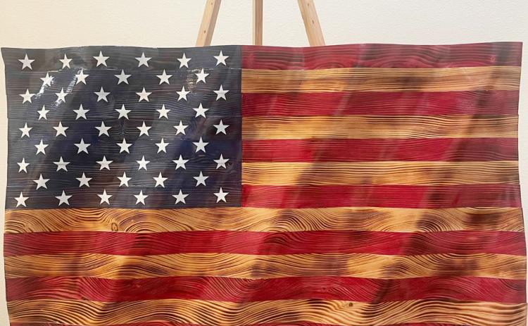 FLAG ART TO HIGHEST BIDDER Following the Memorial Day program in Roaring Springs May 26, there will be an auction of a beautiful, unique, handmade flag, with proceeds going to upkeep of the park. | COURTESY PHOTO