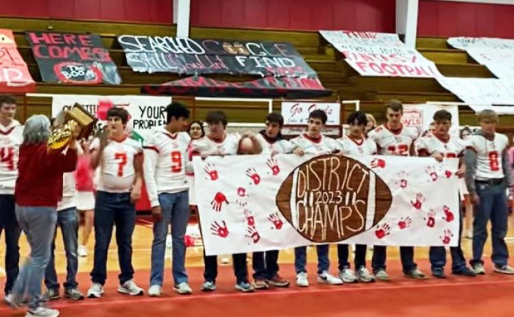 DISTRICT CHAMPS Last week at a pep rally, Silverton ISD superintendent Michelle Francis congratulated the Owls football team and coaches on winning district. | COURTESY PHOTO