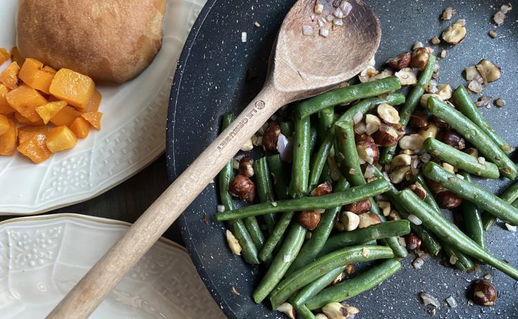 FRESHANDFANCY Fresh green beans seasoned with a garlic are wonderful for our typical dinners, but for the holidays, fresh greens beans accented with shallots and toasted hazelnuts take plain green beans from average to fancy. | ANGELINA LaRUE PHOTO