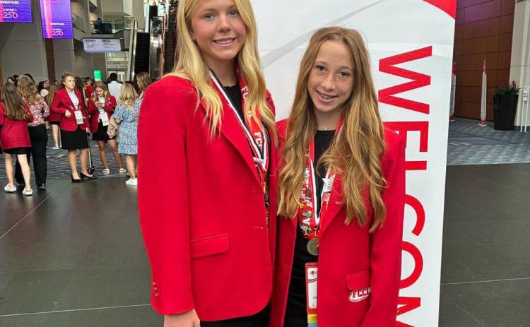 NATIONAL HONOR Guthrie’s Jewel Johnson and Hallie Irons earned a silver medal at the national FCCLA conference last week in Washingtpn, D.C. | COURTESY PHOTO