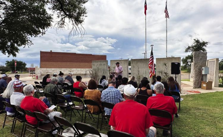 REMEMBRANCE OF LONG AGO—AND LAST WEEK In Roaring Springs July 1, neighbors gathered at the community’s memorial to share thanks for those who fought for the nation’s freedom. Bob Kilmer also remembered Motley County’s recent tornado victims and voiced appreciation for volunteers who came together to support Matador, even including strangers who had no ties to the town. MORE PHOTOS, PAGE 10 | ELLA JENKINS