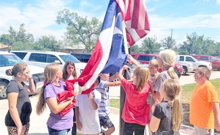 RAISING THE FLAGS