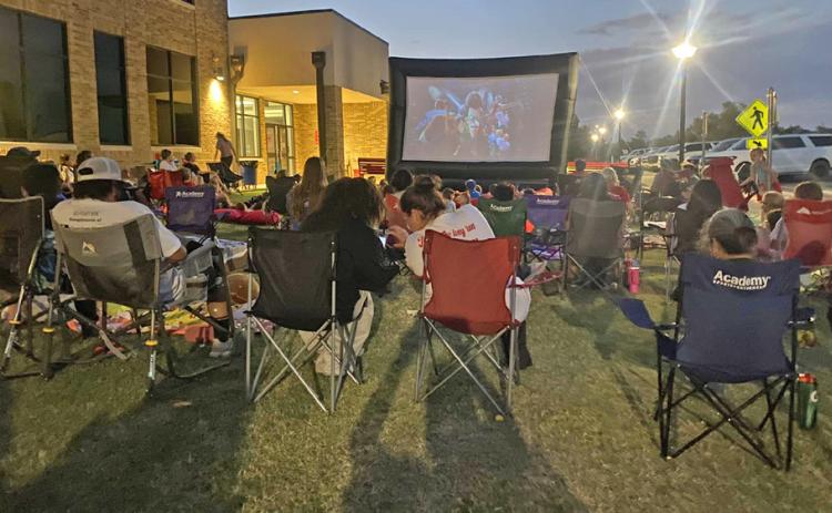 Silverton’s Parent Teacher Organization (PTO) presented their first movie night, showing “Despicable Me 4” on the front lawn of the school, complete with a concession stand, and attendees brought blankets on comfy chairs on Friday, Sept. 13. | COURTESY PHOTO