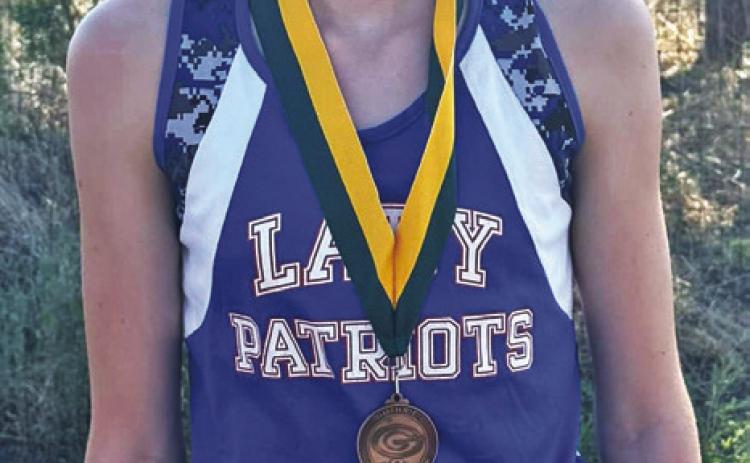 Paisley Cruse won a 10th-place medal in junior high cross country at the Guthrie XC meet last week. | COURTESY PHOTO