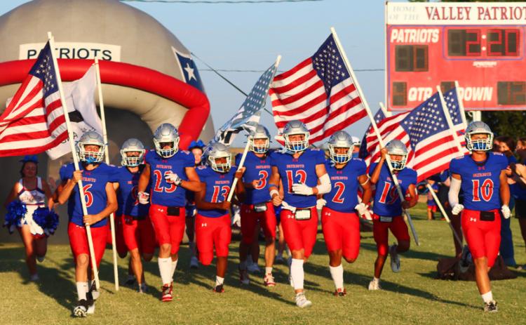 PATRIOTIC DISPLAY by the Valley Patriots ahead of their Sept. 11 bout with the Jayton Jaybirds honored the memory of the 9/11 attacks on the United States. | VALLEY YEARBOOK