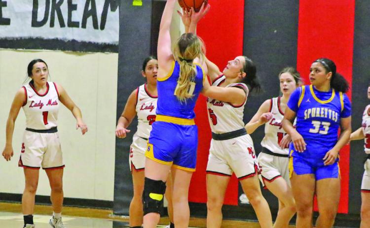 LADY MATS FALL; DISTRICT UPDATE The Motley County girls varsity basketball team fell to Spur last Tuesday 48-34. The win for Spur brought their season record to 7-1. The Spurettes lost to Jayton Friday and fell to a 7-2 record. The Jayton Lady Jays are 9-0 and clinched District 5-1A Friday night. Spur is poised to be district runner-up—and also going to the playoffs-- going into the last game this Tuesday night. | CAPTURED BY CONRAD PHOTO