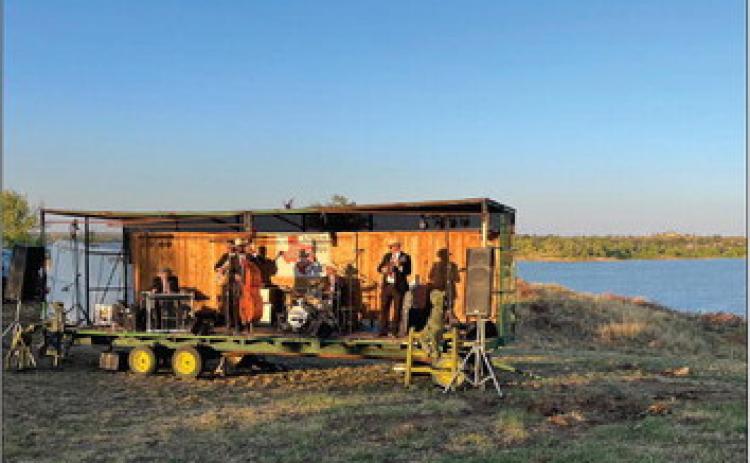 LISTENIN’ BY THE LAKE Western Swing musicians Jake Hooker and the Outsiders performed last weekendatWhiteRiverLake,asabenefitforMatador tornado relief. | COURTESY PHOTO