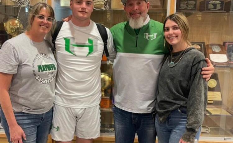 NEW VALLEY COACH Valley has hired Casey Botos, shown here with her husband Hamlin head coach Jason Botos and her family, as the new head girls basketball coach. Amy Bowles, the previous Valley basketball coach, accepted a position at Rankin. | COURTESY PHOTO
