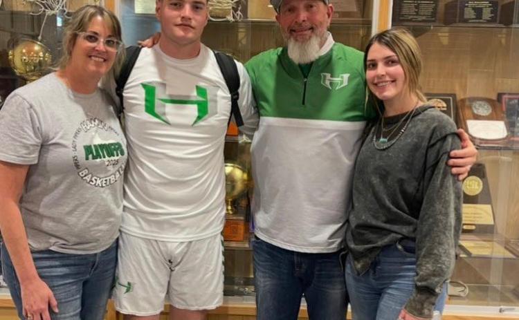 NEW VALLEY COACH Valley has hired Casey Botos, shown here with her husband Hamlin head coach Jason Botos and her family, as the new head girls basketball coach. Amy Bowles, the previous Valley basketball coach, accepted a position at Rankin. | COURTESY PHOTO