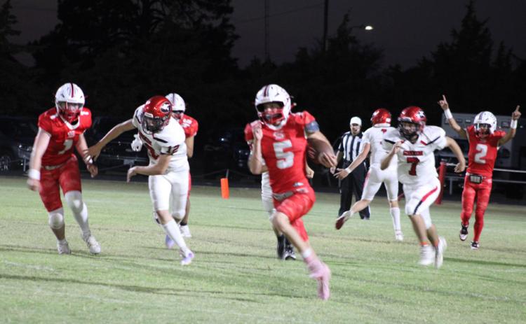 CAGLEOUTRUNSTHETIGERS Slayton Cagle ran all over theTigers Friday night, Oct. 3, scoring several touchdowns for the Owls. | COURTESY PHOTO