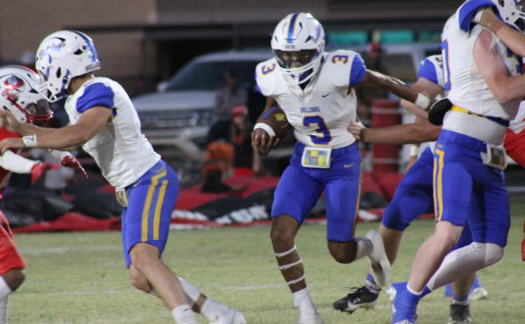 DAWGS DOWN OWLS The Spur Bulldogs remained undefeated in district play by stopping the Silverton Owls 56-6 in Silverton Thursday night. | COURTESY PHOTO