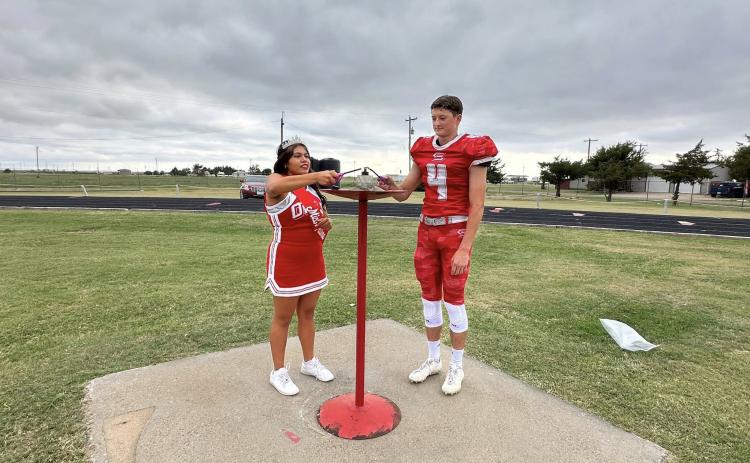 2025 MR AND MISS FLAME Seniors Cooper Mullins and Natalia Deleon lit the flame before the Homecoming game in Silverton on Friday. | COURTESY PHOTO