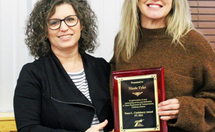 END-OF-YEAR AWARDS Childress District traffic safety specialist Nicole Tyler, right, was the 2022 recipient of the Vance L. “Huck” Castleberry award presented on Thursday, December 1. Presenting the award was Childress District Business Operations Manager Anita Thompson.