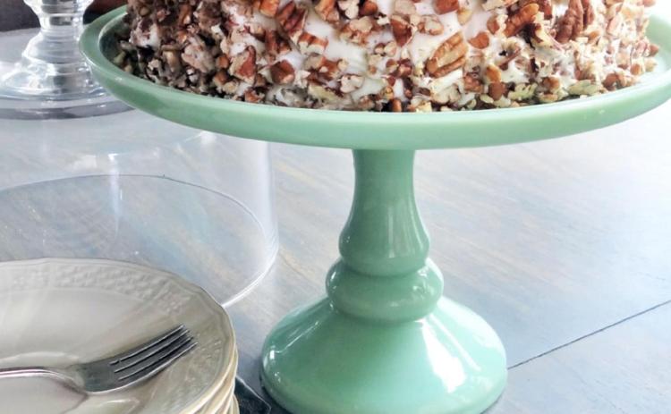 SPECIAL OCCASION CAKE Decorate this cake with chopped or whole pecan halves for a pretty presentation and extra texture. | ANGELINA LARUE