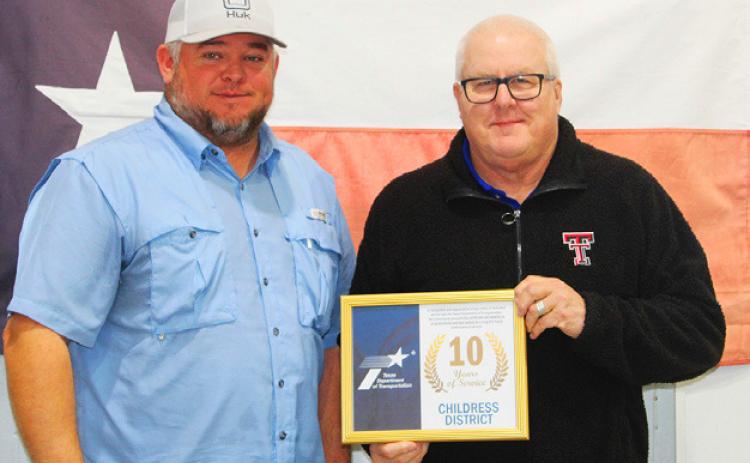 MOTLEYCOUNTY ScottFuiton,maintenance supervisor with Darwin Lankford.