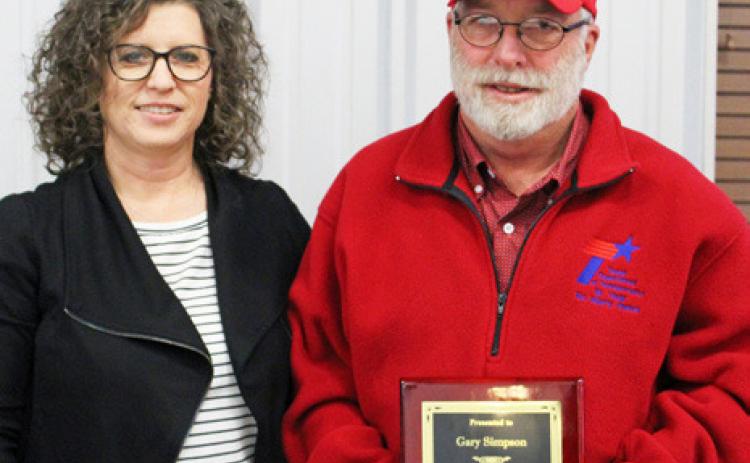 TOP TECH Motley County sign technician Gary Simpson, right, was the 2022 recipient of the Terry L. Keener award presented on Thursday, December 1. Presenting the award was Childress District Business Operations Manager Anita Thompson.