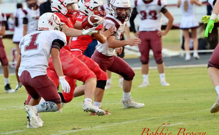 WET CONDITIONS on the field played havoc with the Owls’ best efforts, as the Vernon Northside Indians squeezes by them for the win Thursday night. | COURTESY PHOTO