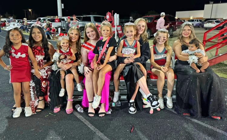 MINI OWLS soaked up attention from Homecoming Court role models before Silverton’s game last week. | HOLLY COGDELL PHOTO