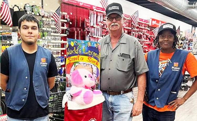 PADUCAH WINNER Congratulations go to Arty Tucker of Paducah, one of the winners of giant Santa Stockings that were given away Friday, December 22 at Plains Lumber in Paducah. | COURTESY PHOTO