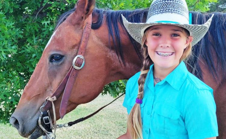 KAYGAN WALKER, 12, says she enjoys riding horses, raising bottle calves, playing sports, raising a garden, and riding mini broncs. | COURTESY PHOTO