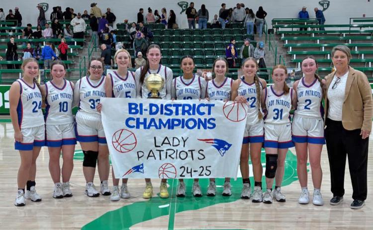 2125 IN 2025—SO FAR Following the Valley Lady Patriots’ bi-district basketball clincher Monday night, Feb. 10, top scorer Trinity Schlueter, #20, was feted for achieving a 2,125-point mark. The Lady Pats are expected to make it a few more rounds — with Schlueter likely adding to that total under Coach Amy Bowles (far right) and her talented teammates. | CERVANTES PHOTOGRAPHY