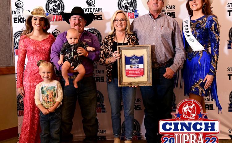NOTTHEIRFIRSTRODEO This year the Cottle-King Old Settlers Reunion&amp;RodeowasnamedMostImprovedRodeooftheYear by the United Professional Rodeo Association, the second time they’vebeenrecognizedassuch.DanaWrightandFrankWright were on hand at the State Fair of Texas last month to receive the award. | COURTESY PHOTO