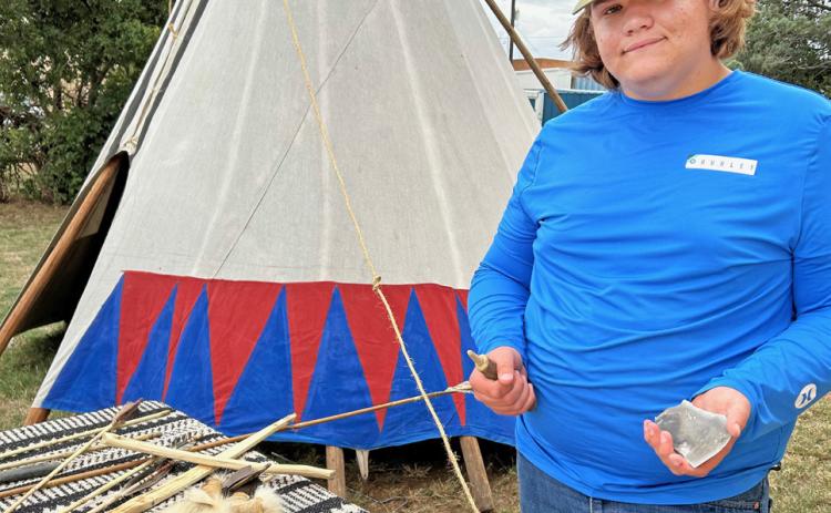 CAUGHT KNAPPING Knapper Sam Montandon of Canyon,Texas, will set up his colorful tipi at the 2025 Comanchero Rendezvous June 14 in Quitaque to entertain and inform guests about knapping, the ancient art of creating tools and points from flint. Several other educational displays will relive the colorful history of five counties along the Caprock. | COURTESY PHOTO